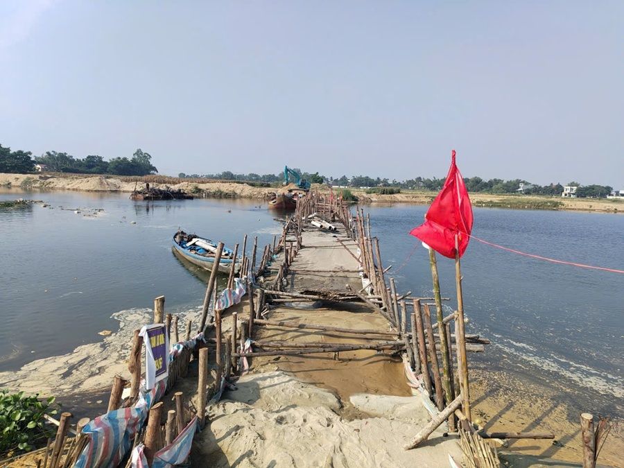Hình 1. Đập thời vụ ngăn mặn sông Vĩnh Điện.jpg